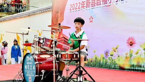 新县启福小学隆重举行庆六一暨第十届校园艺术节文艺汇演